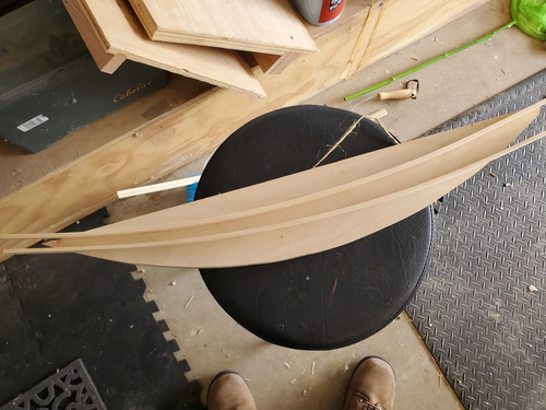 Bent trim after being removed from the semi-circle offcut